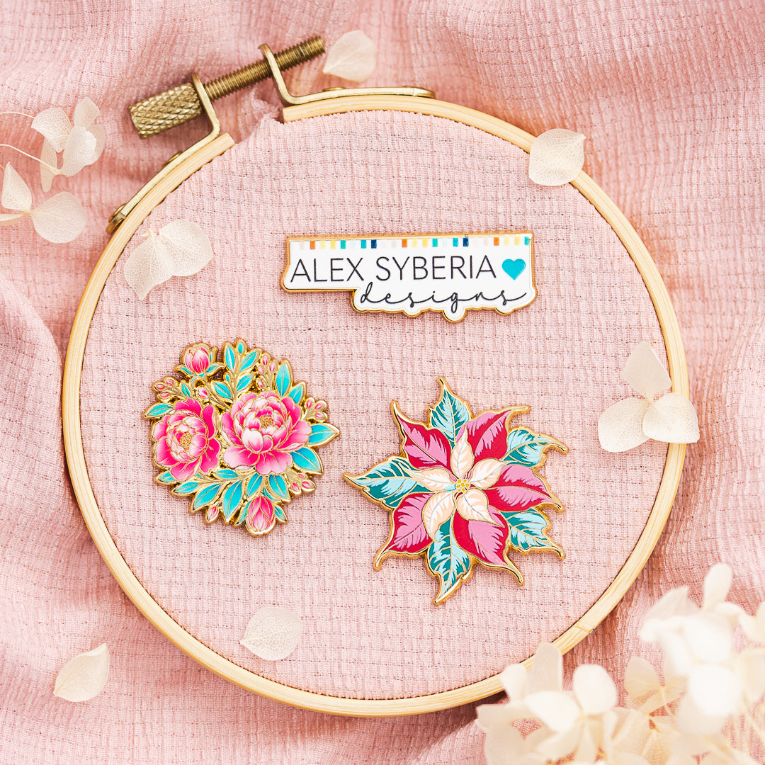 alex syberia designs enamel pins floral and festive poinsettia
